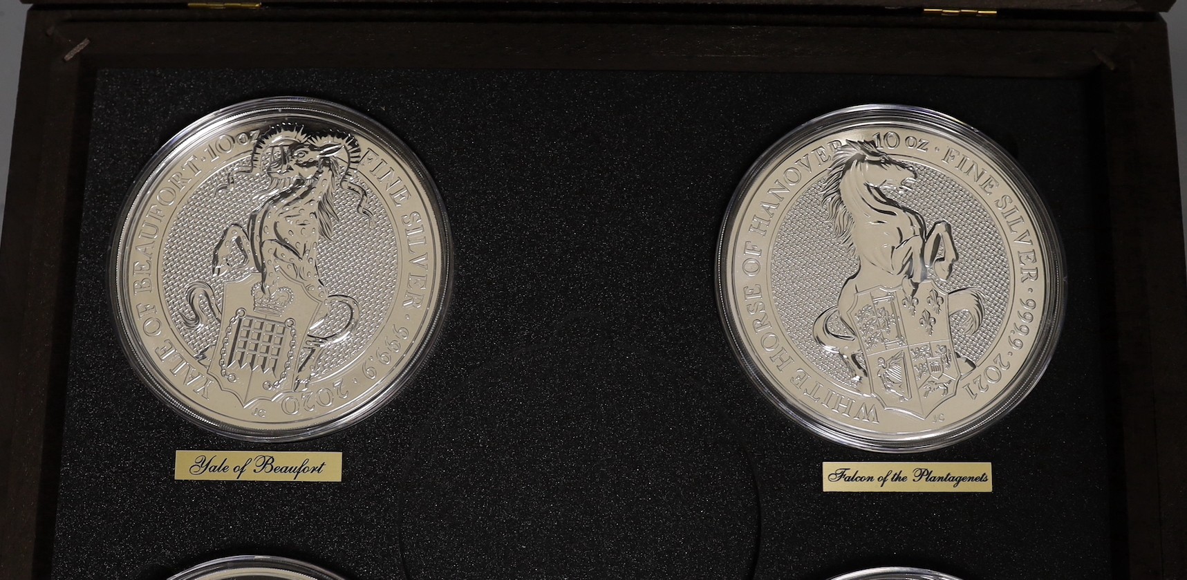 A cased part set of nine Queen's Beasts 10oz. bullion silver £10 coins, BU